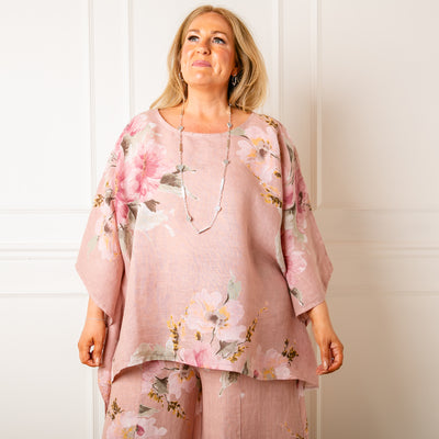 The dusky pink Bouquet Print Linen Top with relaxed drop sleeves for an elegant floaty look